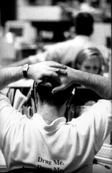 back of businessman acute;s head with head in hands