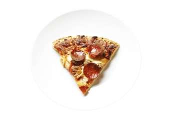 A slice of pizza on a white plate (isolated)