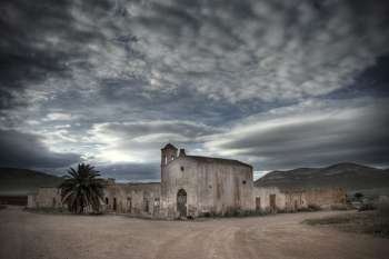 Abandoned buildings and overcast sky