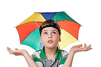 boy with multi-coloured umbrella on head spread his hands aside  isolated on white background