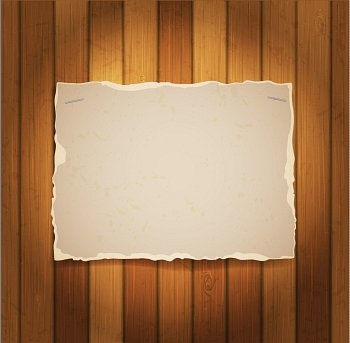 sheet of cardboard on a wood boards