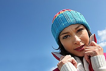 Woman outdoors with wool cap