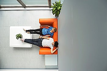 Office Workers Relaxing in Lobby