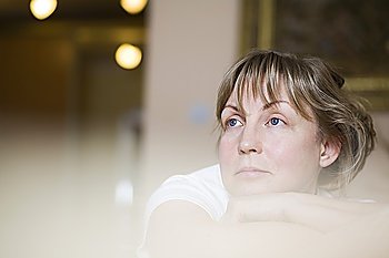 Pensive mature woman  close-up view  selective focus  portrait