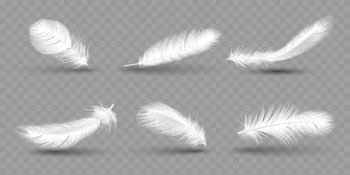 Angelic White feather background - small fluffy white feathers randomly  scattered forming a background Stock Photo
