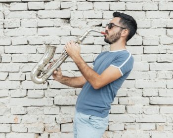 front view musician playing saxophone concept 3