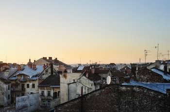 Roof tops of Lviv at sunrise  Ukraine