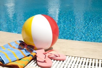 Summer vacation accessoires  by the swimming pool